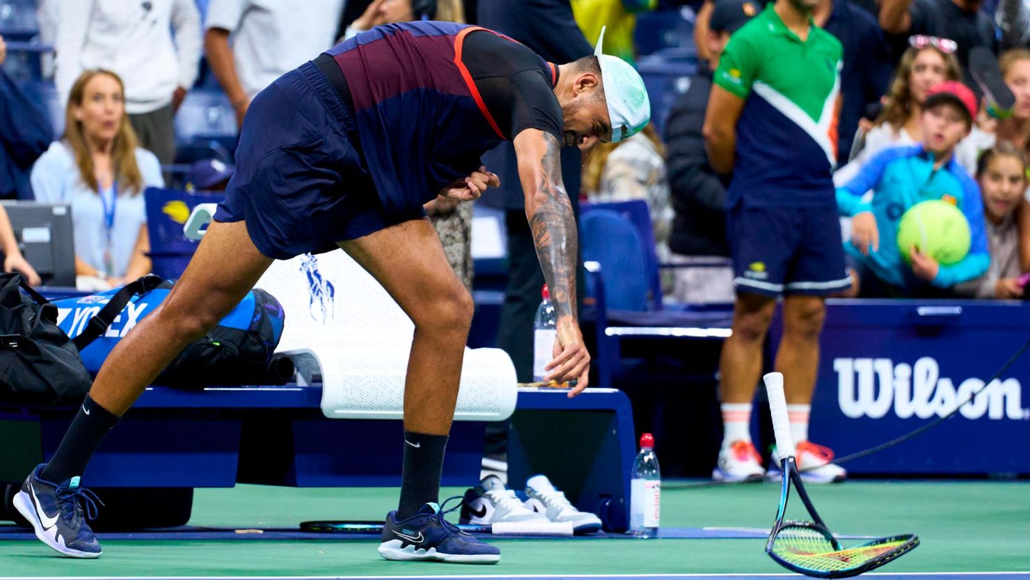 Nick Kyrgios smashes his racket after being defeated by Karen Khachanov in the US Open quarterfinals.