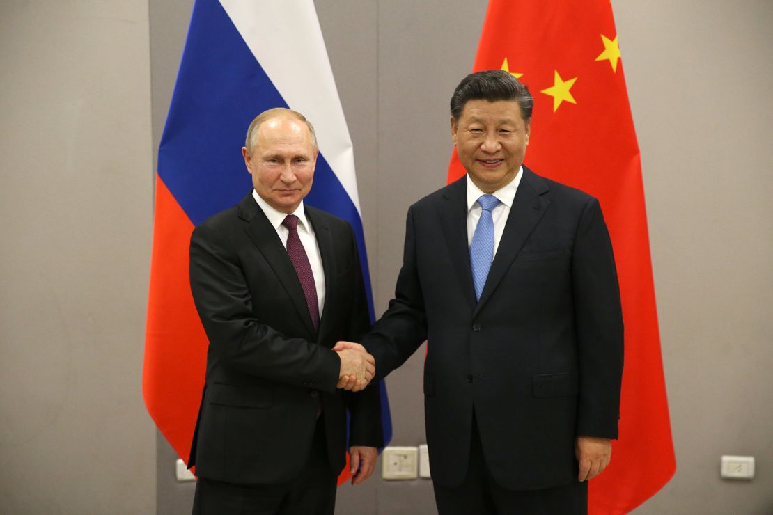 Russian President Vladimir Putin with Chinese leader Xi Jinping on November 13, 2019, in Brasilia, Brazil. 