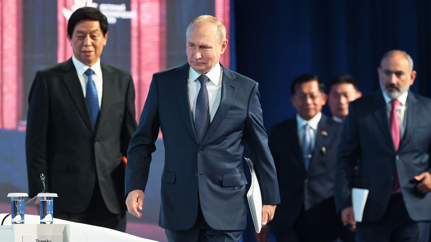 Russian President Vladimir Putin, center, Chairman of National People's Congress Li Zhanshu, left, attend a plenary session at the Eastern Economic Forum in Vladivostok, Russia.