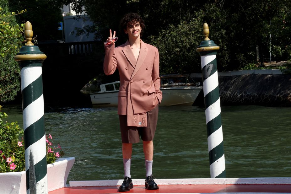 Actor Jack Dylan Grazer arrived in Venice wearing a rosy-hued oversized blazer and brown suit shorts.