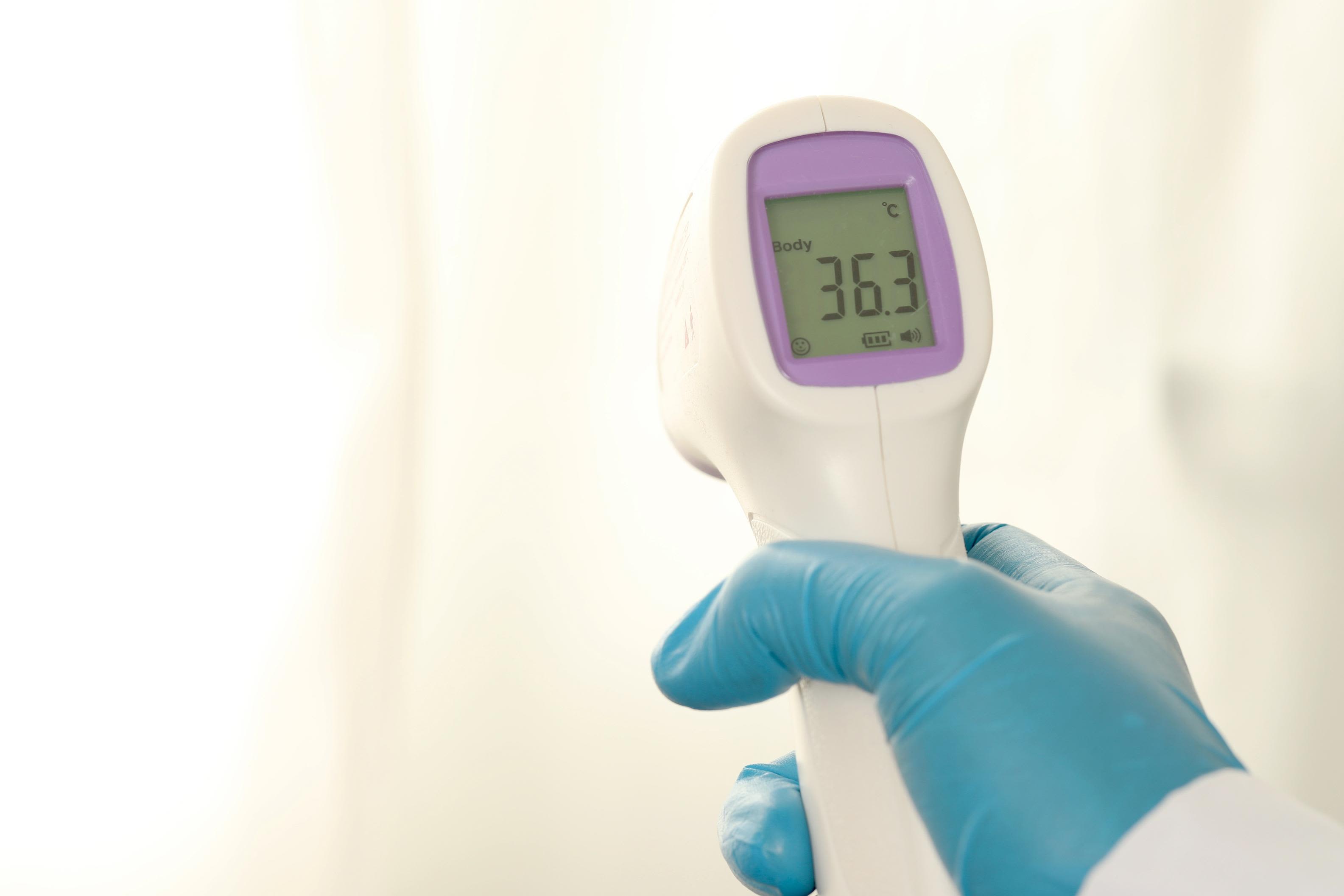 Premium Photo  Medical electronic thermometer on a black background high  temperature the concept of diagnosis of diseases