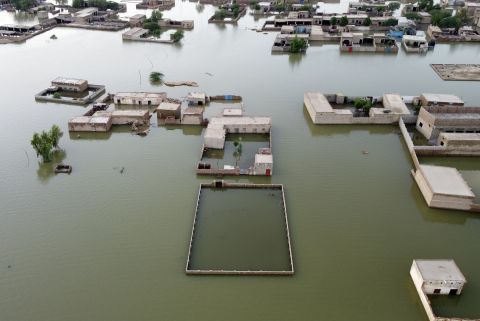 Homes are surrounded by floodwaters in Jaffarabad, Pakistan, on Thursday, September 1.