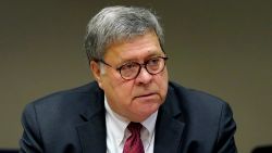 US Attorney General William Barr, left, meets with members of the St. Louis Police Department, October 15, 2020, in St. Louis, Missouri. - The officers are among several in the department who have been shot in the line of duty this year. (Photo by Jeff Roberson / POOL / AFP) (Photo by JEFF ROBERSON/POOL/AFP via Getty Images)