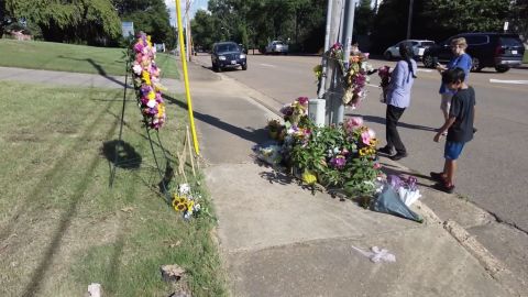 People gather at a memorial for Eliza Fletcher on September 7, 2022, near where she was abducted in Memphis, Tennessee.