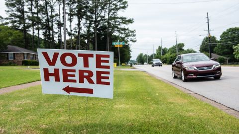 A "Vote Here" sign located outside a polling station in Huntsville, Alabama, US, on Tuesday, May 24, 2022. 