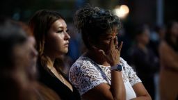 A woman cries during a vigil for the stabbing attack victims in Prince Albert, Saskatchewan, Canada, on September 7, 2022. - The last suspect in the stabbing spree in a remote western Canadian Indigenous community died after being arrested on September 7, 2022 at the end of a long manhunt, local media said. 