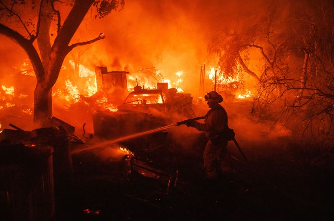 A firefighter battles the <a href="index.php?page=&url=https%3A%2F%2Fwww.cnn.com%2F2022%2F09%2F06%2Fus%2Fcalifornia-fairview-fire%2Findex.html" target="_blank">Fairview Fire</a> near Hemet, California, on September 5. The hot and dry conditions mean that fires will spread more quickly, rage more intensely and burn for longer.
