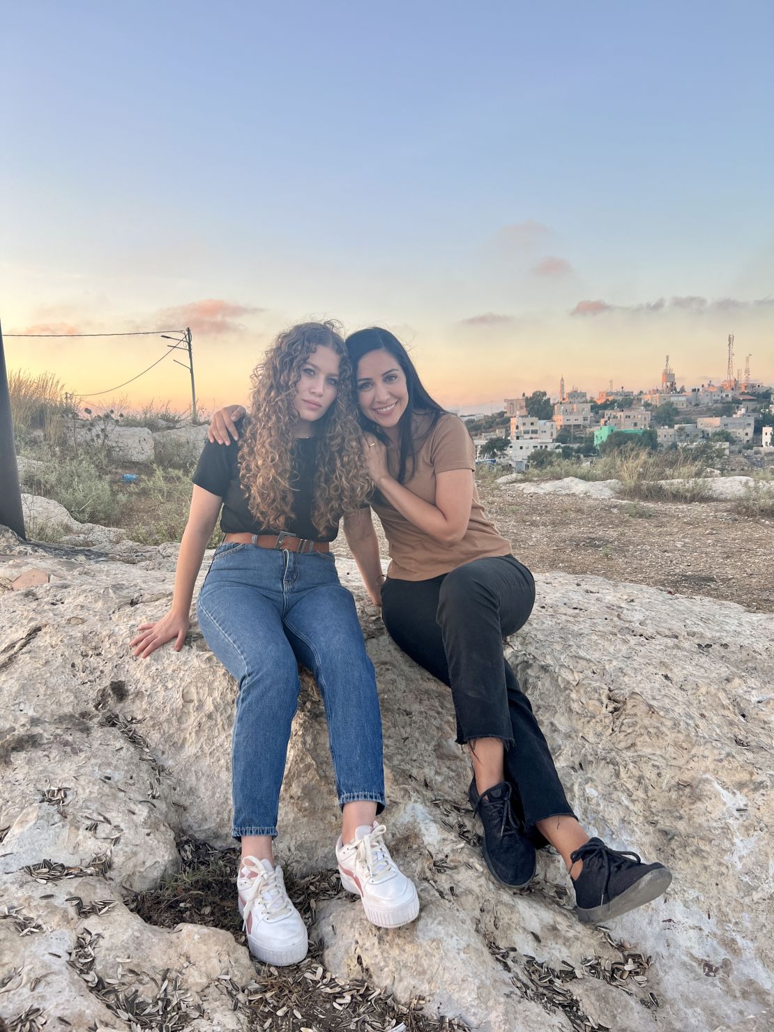Ahed Tamimi, left, and Dena Takruri posing for a photograph in the West Bank region of the Palestinian territories.