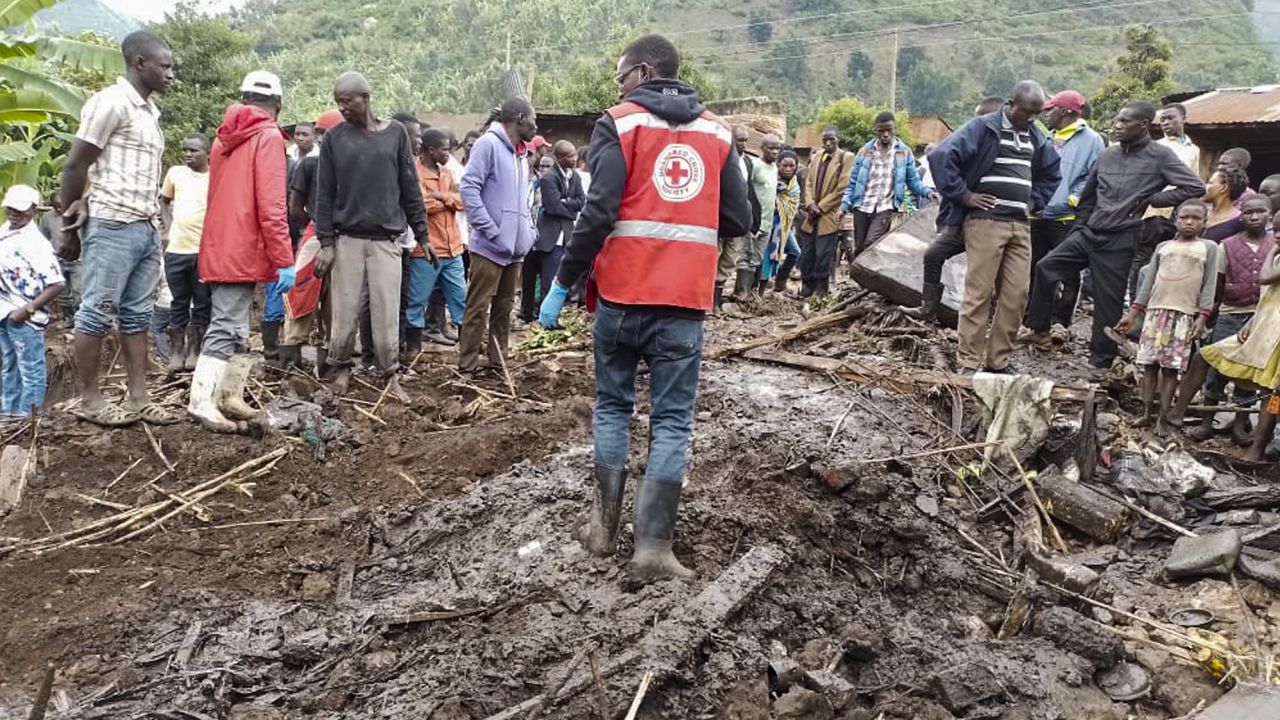Rescuers from the Uganda Red Cross Society attend the scene of a landslide in Kasika village, Kasese district, in southwestern Uganda Wednesday, Sept. 7, 2022.