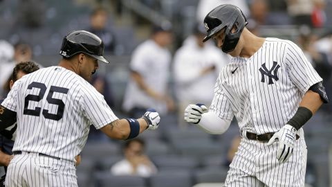 Judge celebrates with Gleyber Torres after hitting his fourth inning home run.