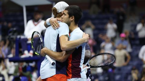 Alcaraz and Sinner embrace after their marathon quarterfinals at the US Open. 