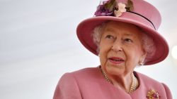 SALISBURY, ENGLAND - OCTOBER 15: Britain's Queen Elizabeth II speaks with staff during a visit to the Defence Science and Technology Laboratory (Dstl) at Porton Down science park on October 15, 2020 near Salisbury, England. The Queen and the Duke of Cambridge visited the Defence Science and Technology Laboratory (Dstl) where they were to view displays of weaponry and tactics used in counter intelligence, a demonstration of a Forensic Explosives Investigation and meet staff who were involved in the Salisbury Novichok incident. Her Majesty and His Royal Highness also formally opened the new Energetics Analysis Centre. (Photo by Ben Stansall/WPA Pool/Getty Images)