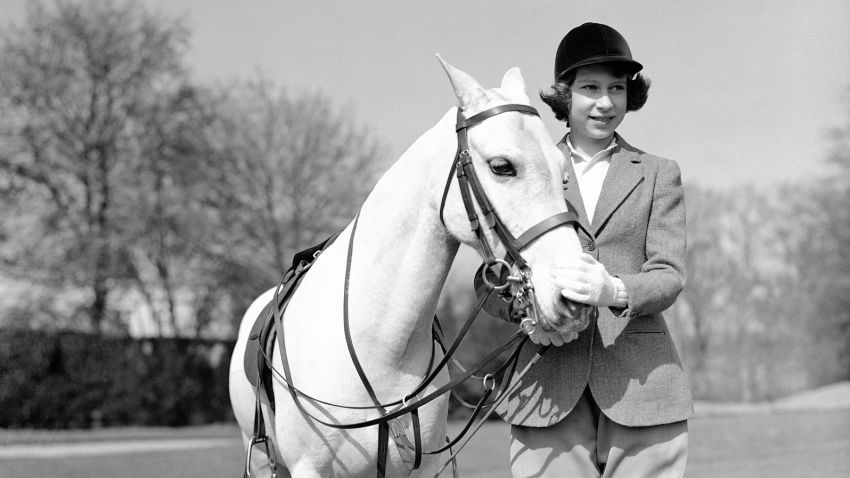 Princess Elizabeth the eldest daughter of King George VI and Queen Elizabeth celebrated her 13th birthday on April 21. The Princess was allowed to plan her own day, as it was her birthday, and after opening her presents in the morning, she went riding in Windsor Great Park with the King and Princess Margaret, her younger sister. She is a giving a tea party, to which the King and Queen and Queen Mary have been invited at Windsor Castle, where the court is at present. The Princess's birthday presents included a diamond bracelet from the King and clothes, among which were silk stockings from the Queen. Princess Elizabeth after her ride in Windsor Great Park, in England, on April 21, 1939. (AP Photo)