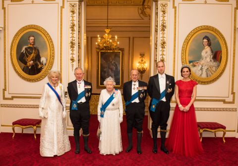 William and Catherine join from left, Camilla, Duchess of Cornwall; Prince Charles; Queen Elizabeth II; and Prince Philip at a Buckingham Palace reception in December 2016.