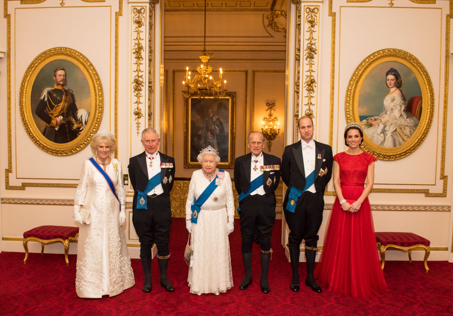 William and Catherine join from left, Camilla, Duchess of Cornwall; Prince Charles; Queen Elizabeth II; and Prince Philip at a Buckingham Palace reception in December 2016.