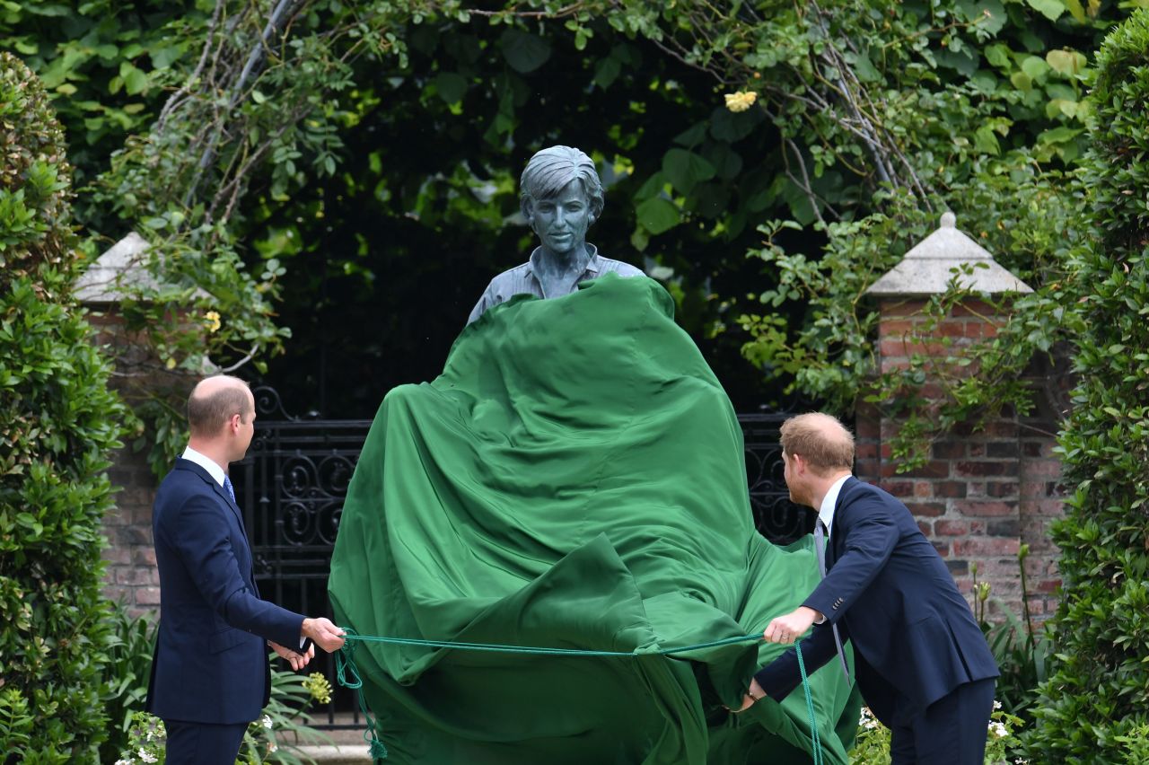 William and Harry unveil a statue they commissioned of their mother on what would have been her 60th birthday in July 2021.