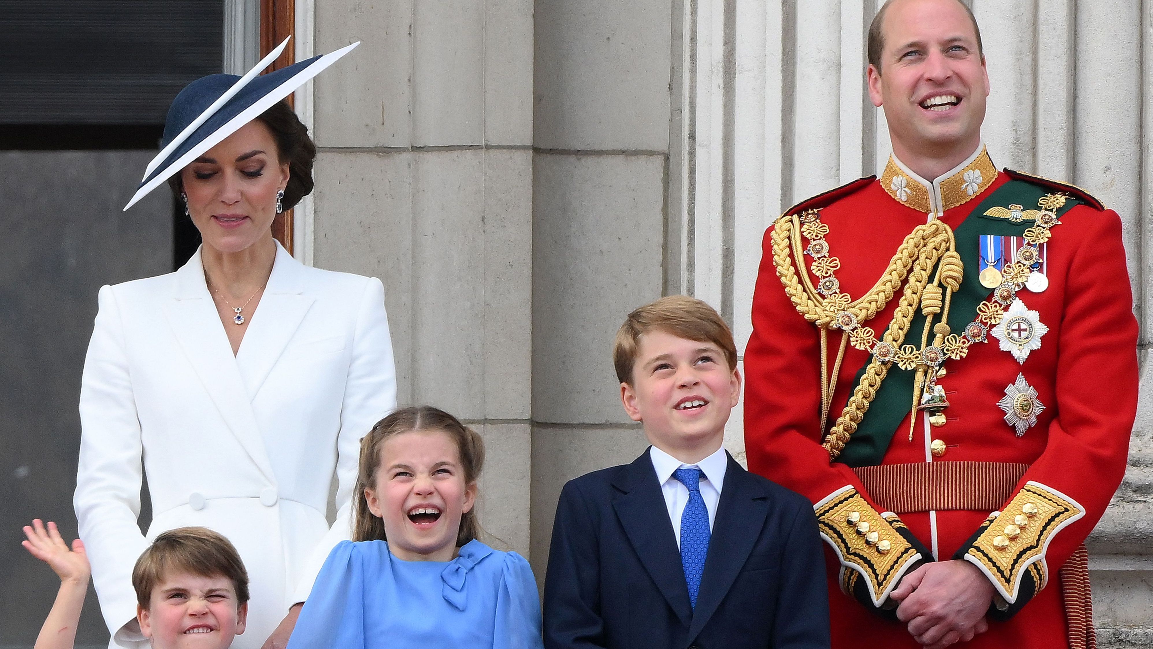 William and Catherine stand with their children -- from left, Louis, Charlotte and George -- on the balcony of Buckingham Palace in June 2022. It was after the Trooping the Colour parade.
