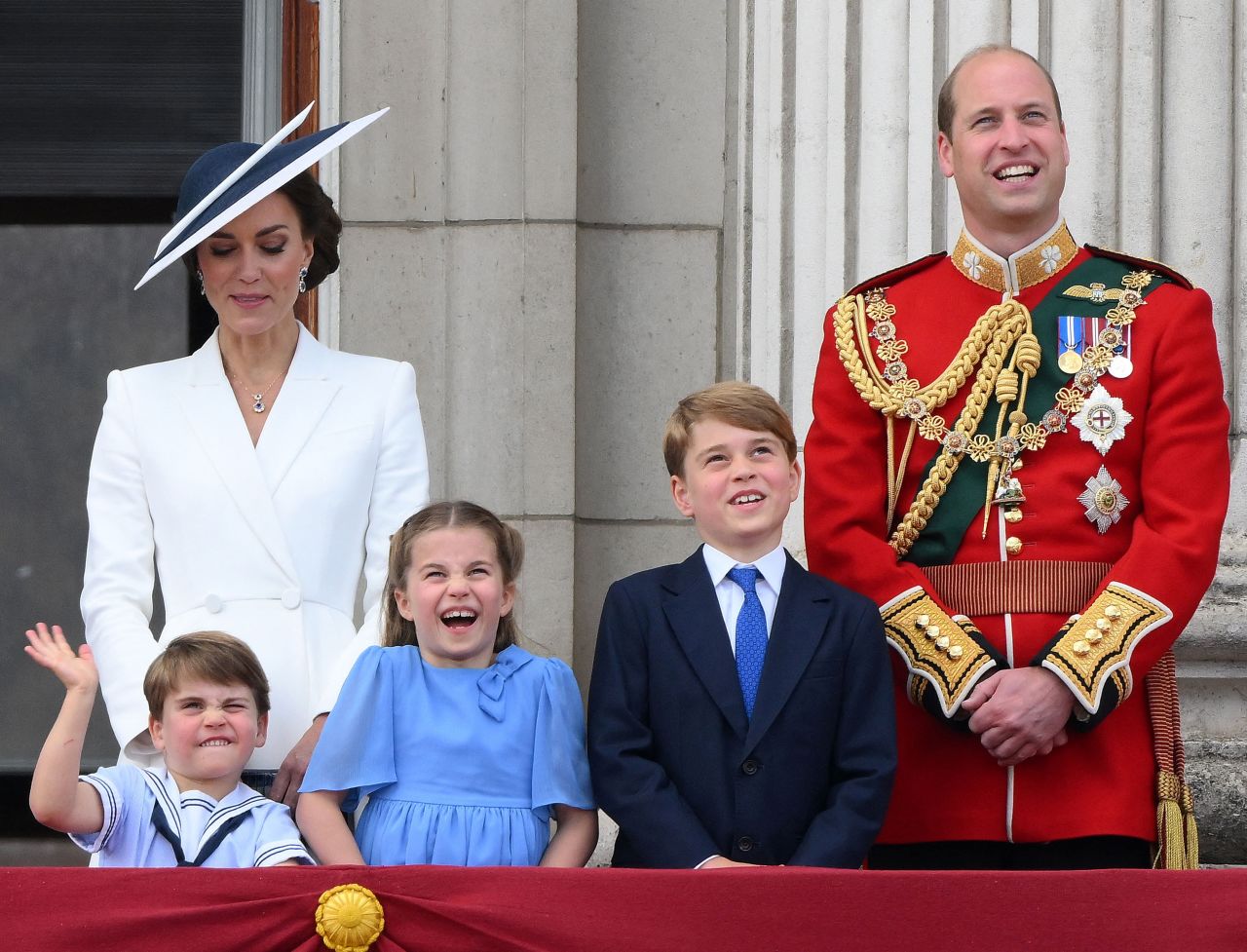 William and Catherine stand with their children -- from left, Louis, Charlotte and George -- on the balcony of Buckingham Palace in June 2022. It was after the Trooping the Colour parade.