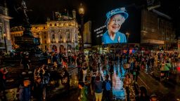 The Piccadilly Lights are cleared of adverts and show a tribute to the Queen. Queen Elizabeth the second is dead in her Platinum Jubillee year. The announcement came early this evening from Balmoral Castle.
Queen Elizabeth the second died today at Balmoral., Buckingham Palace, London - 08 Sep 2022