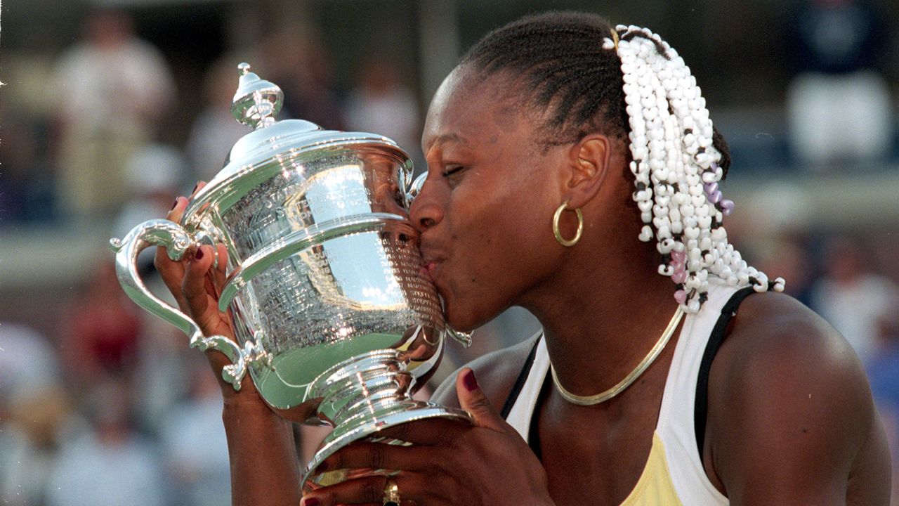 Williams kisses the trophy after beating Martina Hingis at the US Open final. 