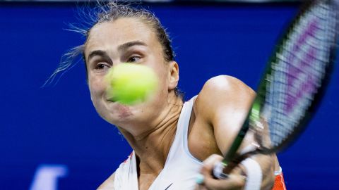 Sabalenka plays a return against Jabeur. 