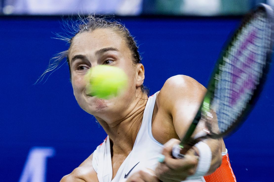 Sabalenka plays a return against Jabeur. 