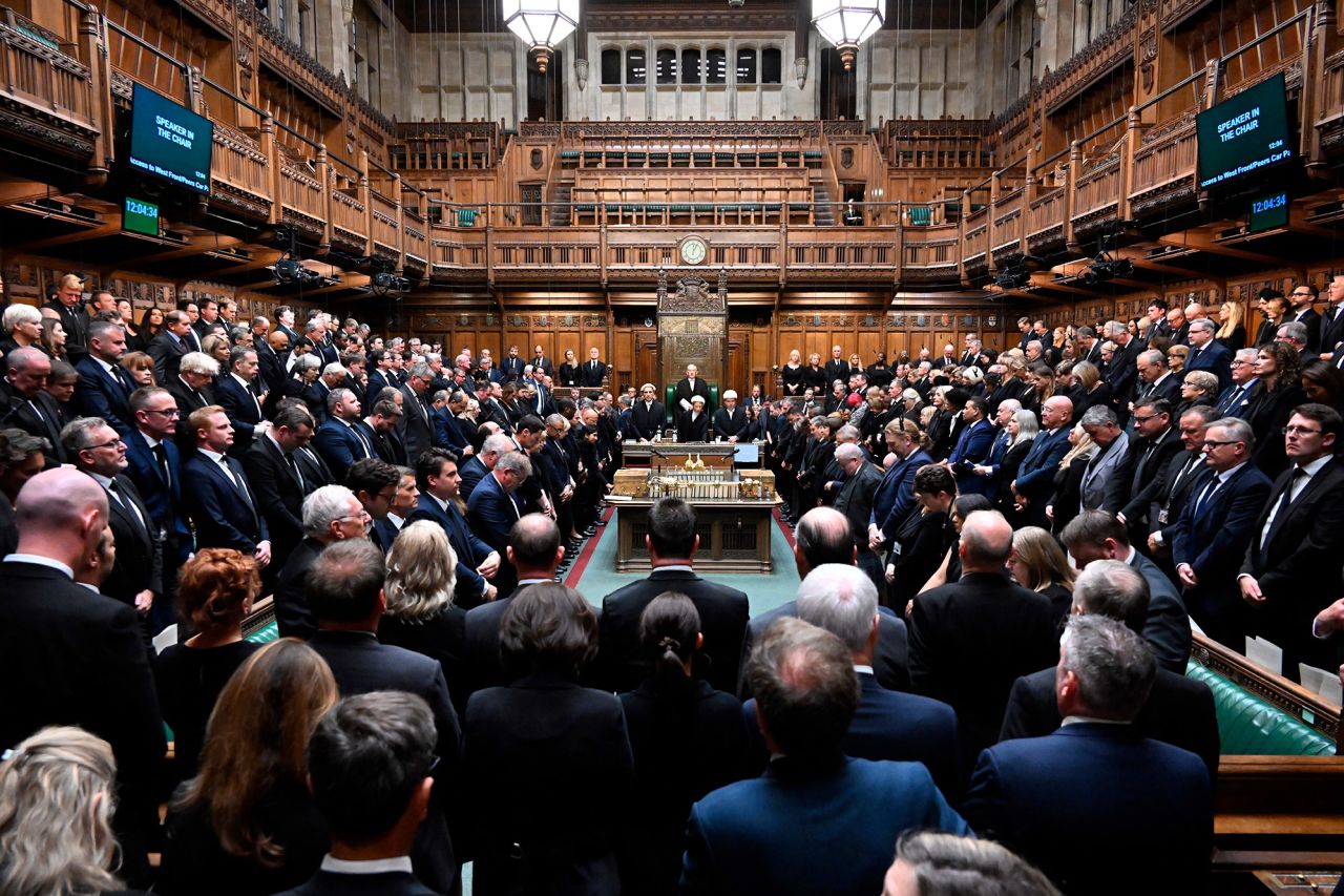 Members of Parliament observe a minute of silence in memory of the Queen.