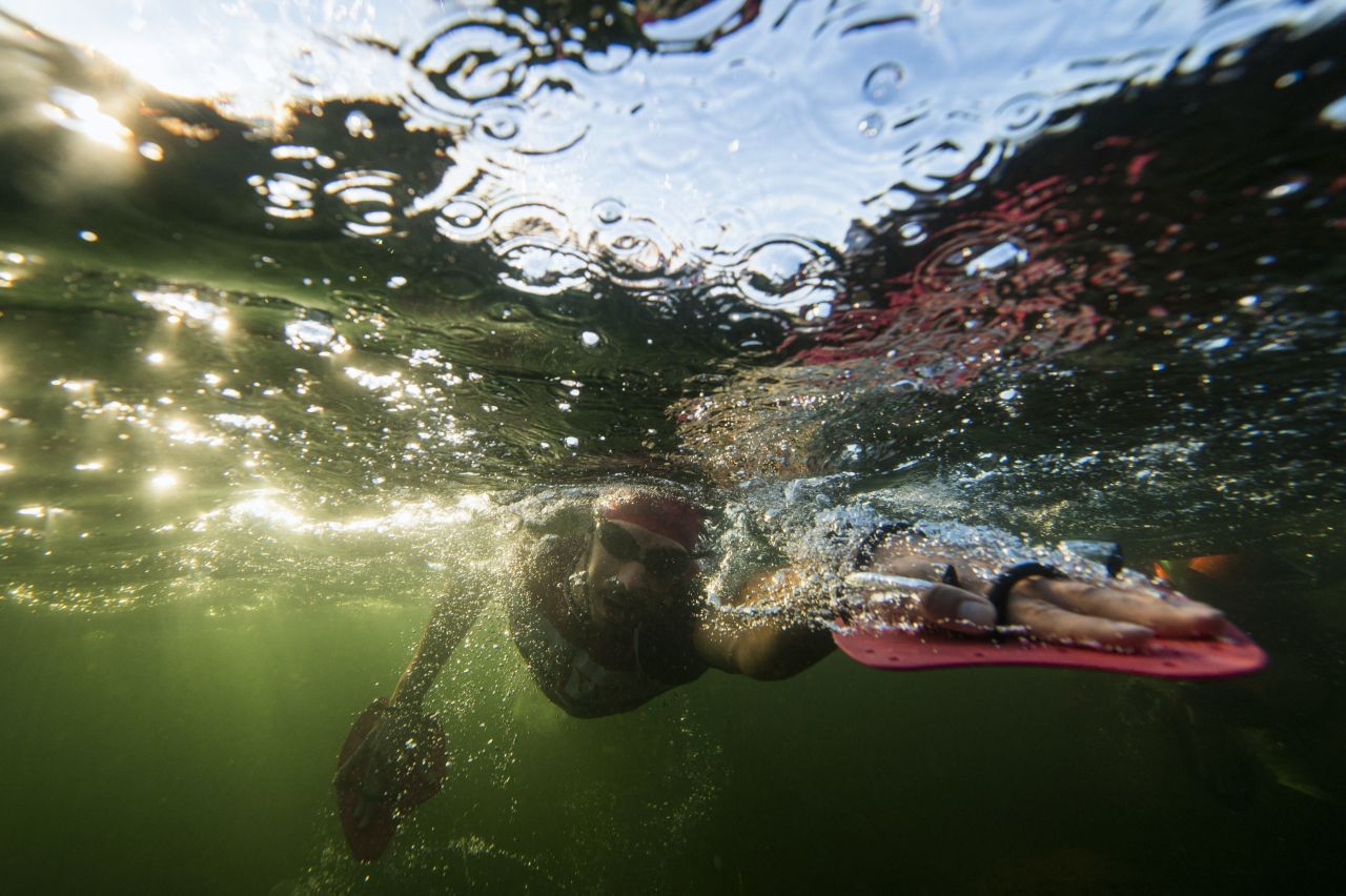 Athletes compete during the Swimrun World Championship in Sandhamn, Sweden, on Monday, September 5. Team members are linked by a leash and have to compete together in an open-water swim and a run.