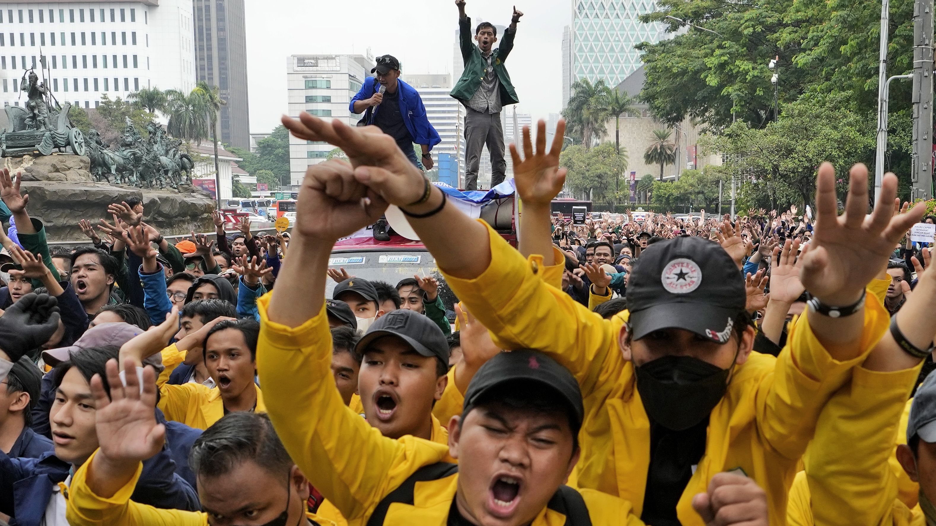 Student activists shout slogans in Jakarta, Indonesia, on Thursday, September 8, during a rally against sharp increases in fuel prices.