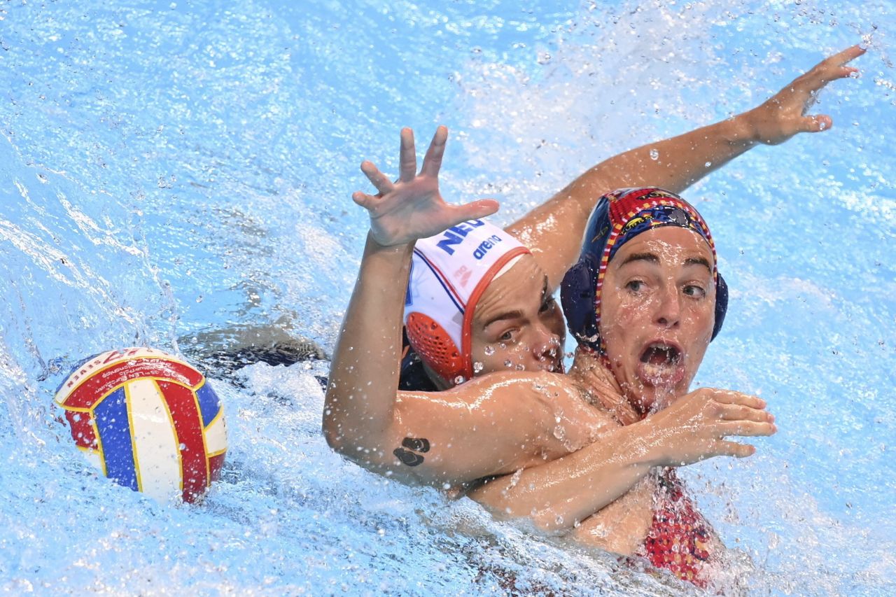 Dutch water polo player Bente Rogge, left, competes against Spain's Maica Garcia Godoy during a semifinal match at the European Water Polo Championships on Wednesday, September 7.