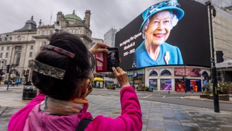 A portrait of Queen Elizabeth II on display in London's Piccadilly Circus on Friday morning.