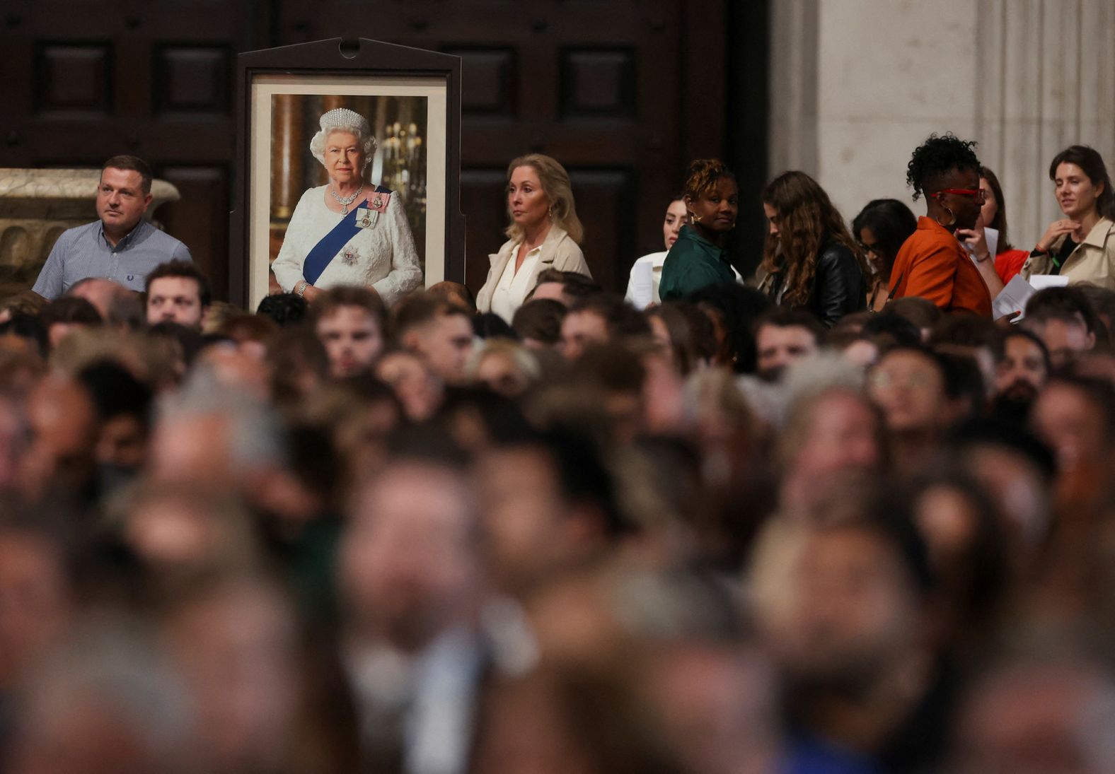 Members of the public arrive for the remembrance ceremony at St. Paul's Cathedral.