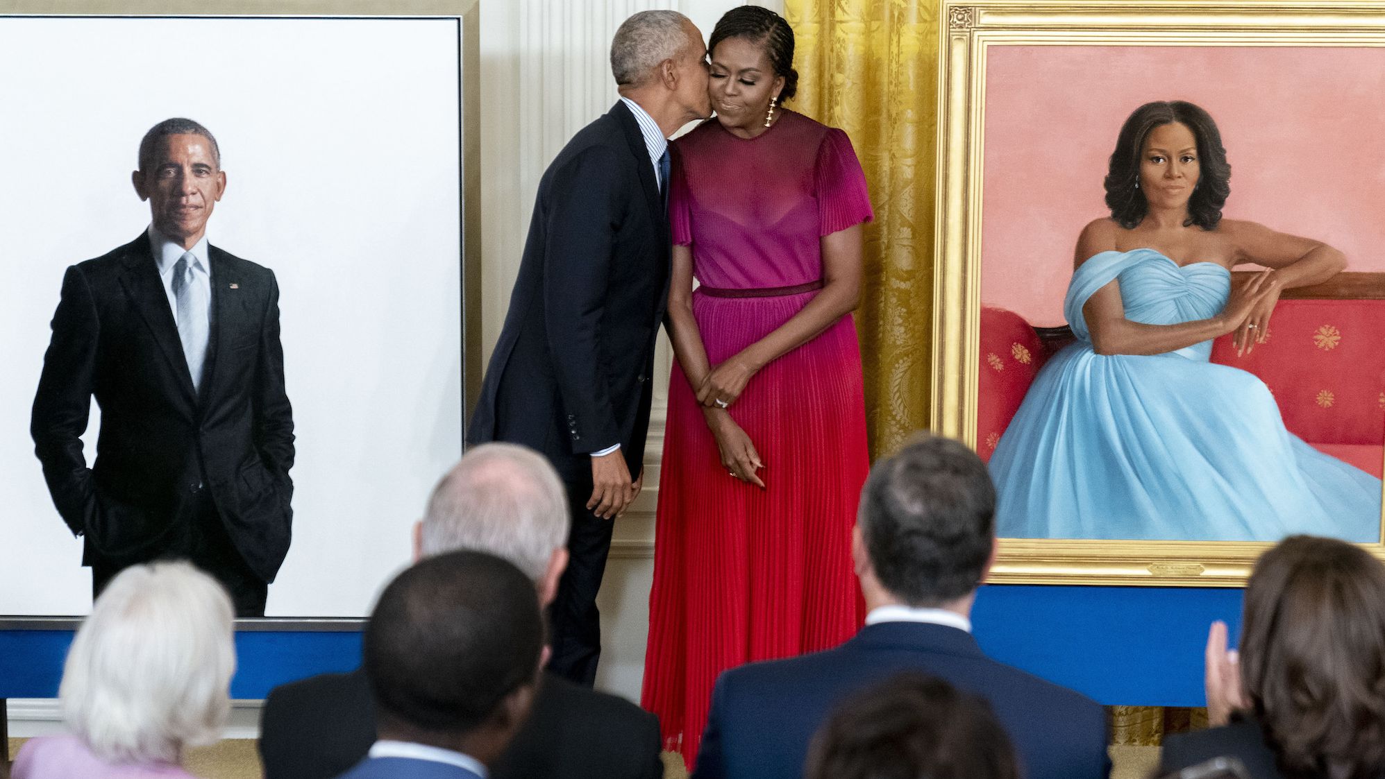 Former US President Barack Obama kisses his wife, former first lady Michelle Obama, after <a href="https://www.cnn.com/2022/09/07/politics/obamas-white-house-official-portraits/index.html" target="_blank">the unveiling of their official White House portraits</a> on Wednesday, September 7.