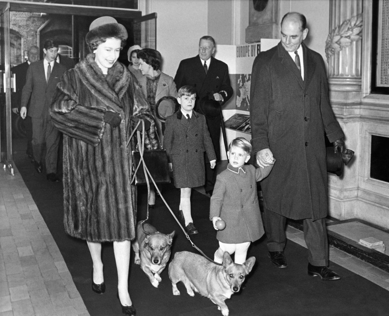 The Queen leads her corgis into Liverpool Street Station in London in 1966.