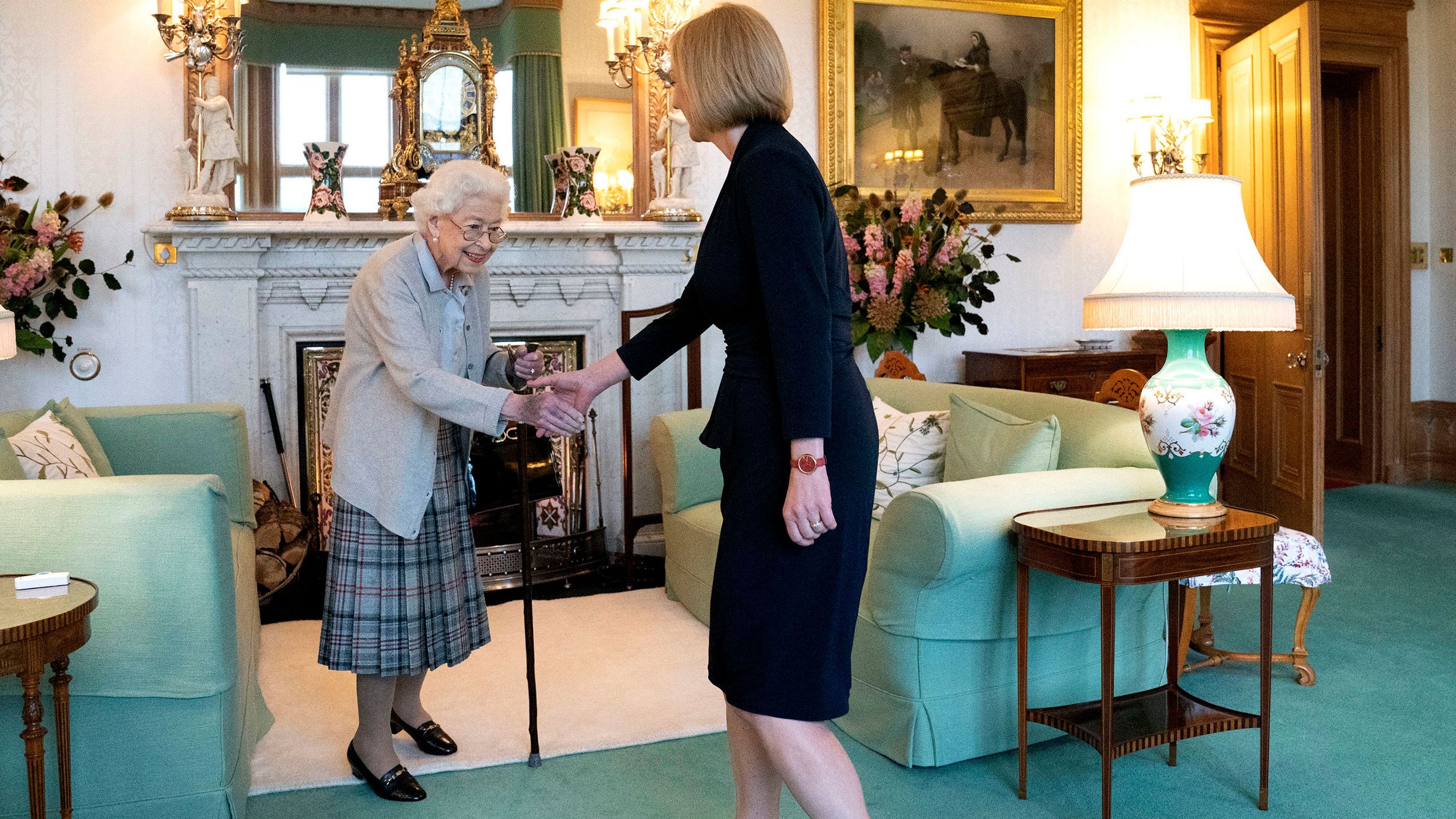 Britain's Queen Elizabeth II welcomes Liz Truss at Scotland's Balmoral Castle on Tuesday, September 6. The Queen invited Truss to become prime minister and form a new government.