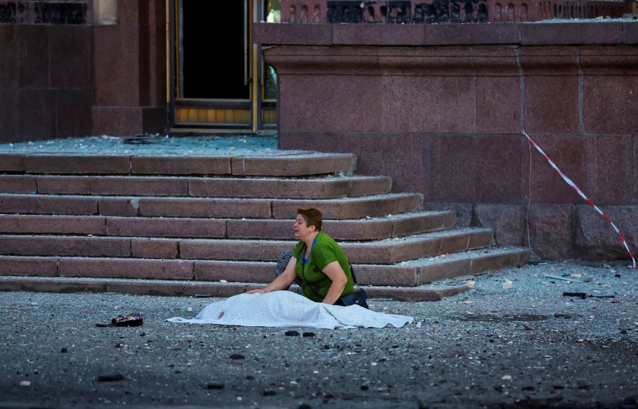 A woman reacts next to the body of her mother, who was killed by shelling in Donetsk, Ukraine, on Friday, September 2.