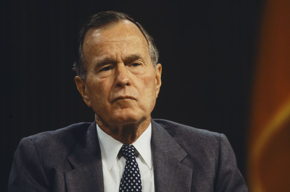 Former president George H.W. Bush attends the inaugural conference at the Baker Institute for Public Policy at Rice University in Houston, Texas, on November 13, 1995. 