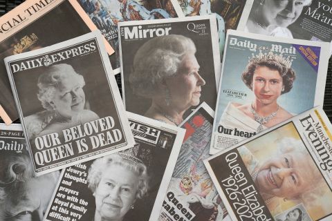 Newspapers covering the Queen's death are seen in Manchester, England, on Friday, September 9.