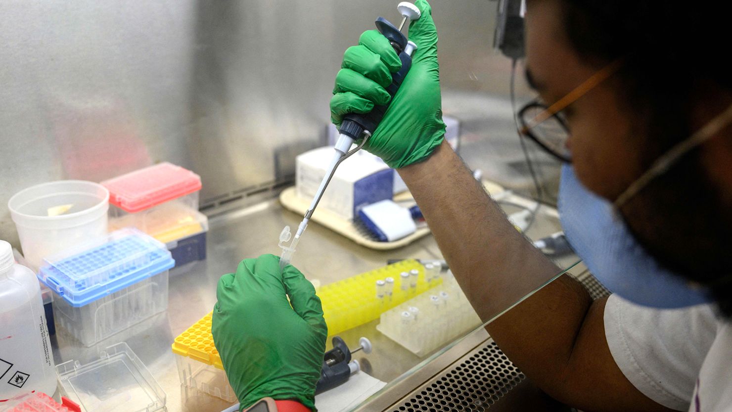 A research assistant prepares a PCR reaction for polio at a lab at Queens College on August 25, 2022, in New York.