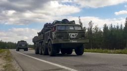 In this handout photo taken from video released by Russian Defense Ministry Press Service on Friday, Sept. 9, 2022, Russian military vehicles drive to the Kharkiv direction on a mission in Ukraine.