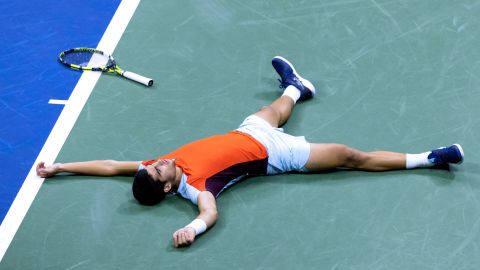 Alcaraz celebrates after winning the semifinal match against Tiafoe. 