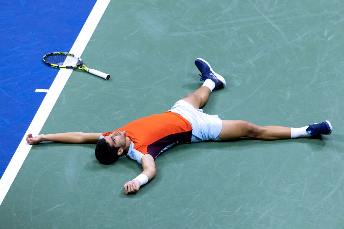 Alcaraz celebrates after winning the semifinal match against Tiafoe. 