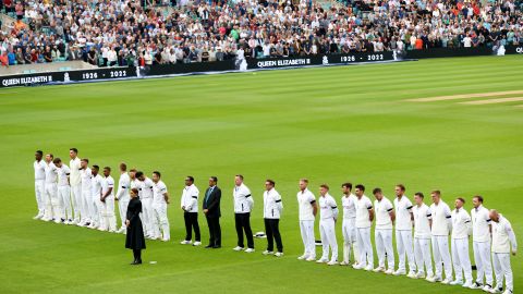 Players and spectators observe a minute silence, as LED boards around the stadium pay tribute to Her Majesty Queen Elizabeth II.