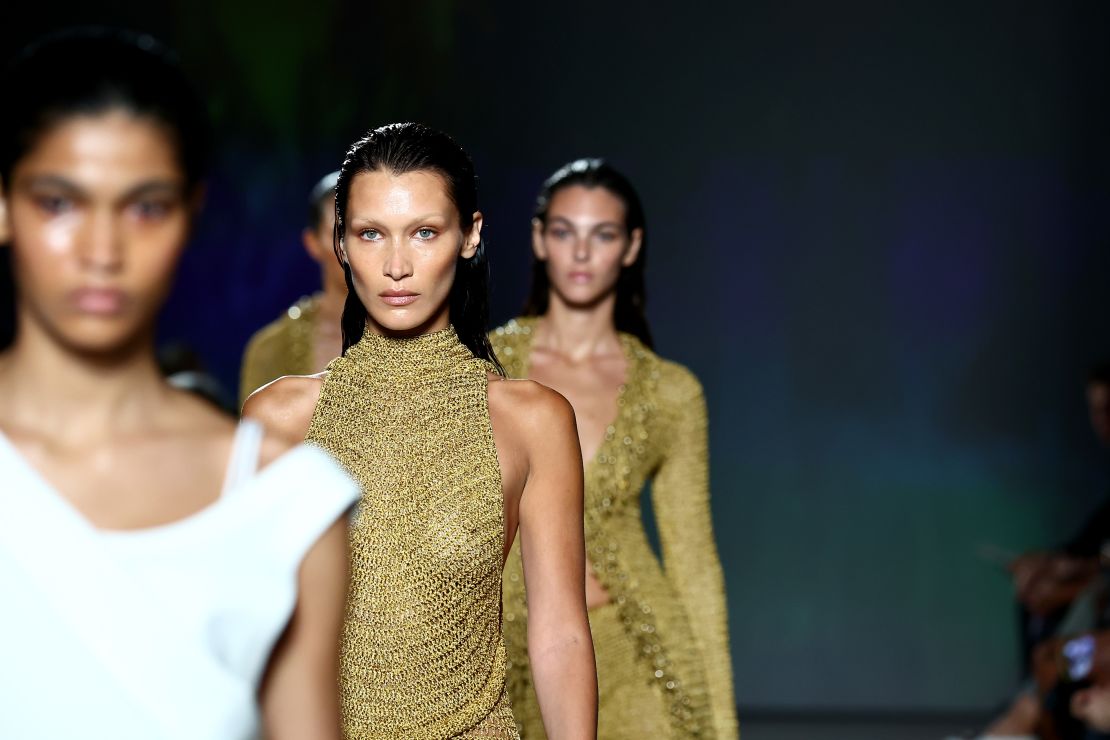 At Proenza Schouler, models including Bella Hadid were styled with dewy skin and slicked-back hair.