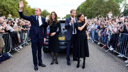 WINDSOR, ENGLAND - SEPTEMBER 10: Catherine, Princess of Wales, Prince William, Prince of Wales, Prince Harry, Duke of Sussex, and Meghan, Duchess of Sussex wave to crowd on the long Walk at Windsor Castle on September 10, 2022 in Windsor, England. Crowds have gathered and tributes left at the gates of Windsor Castle to Queen Elizabeth II, who died at Balmoral Castle on 8 September, 2022. (Photo by Chris Jackson - WPA Pool/Getty Images)
