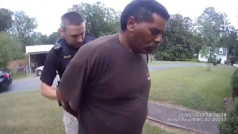 A Black pastor arrested while watering his neighbor's flowers has filed a federal lawsuit | CNN