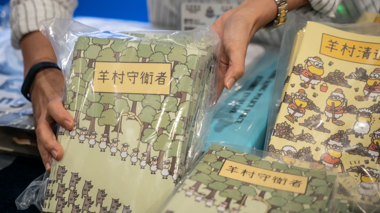 A Hong Kong police press conference on July 22, 2021, displays images of the children's books deemed seditious.