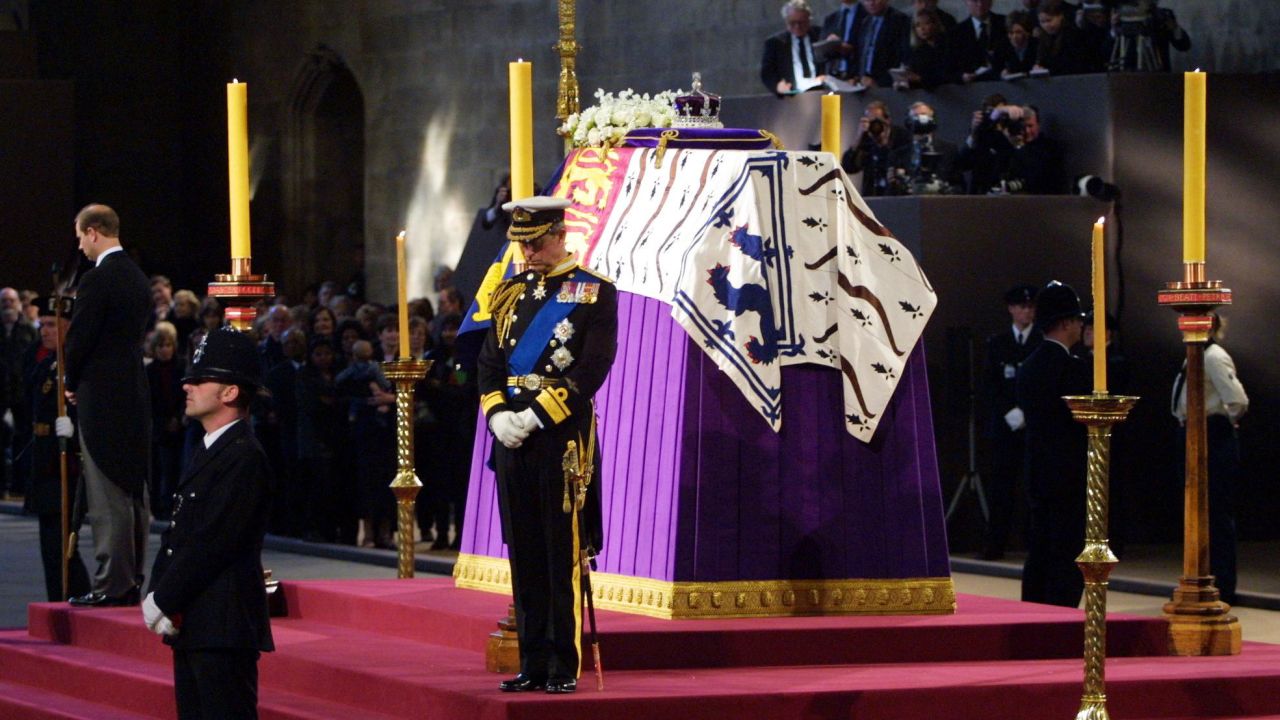 Then-Prince Charles and his brother Edward, left, stand vigil beside their grandmother's coffin while the Queen Mother lies in state at Westminster Hall in 2002.