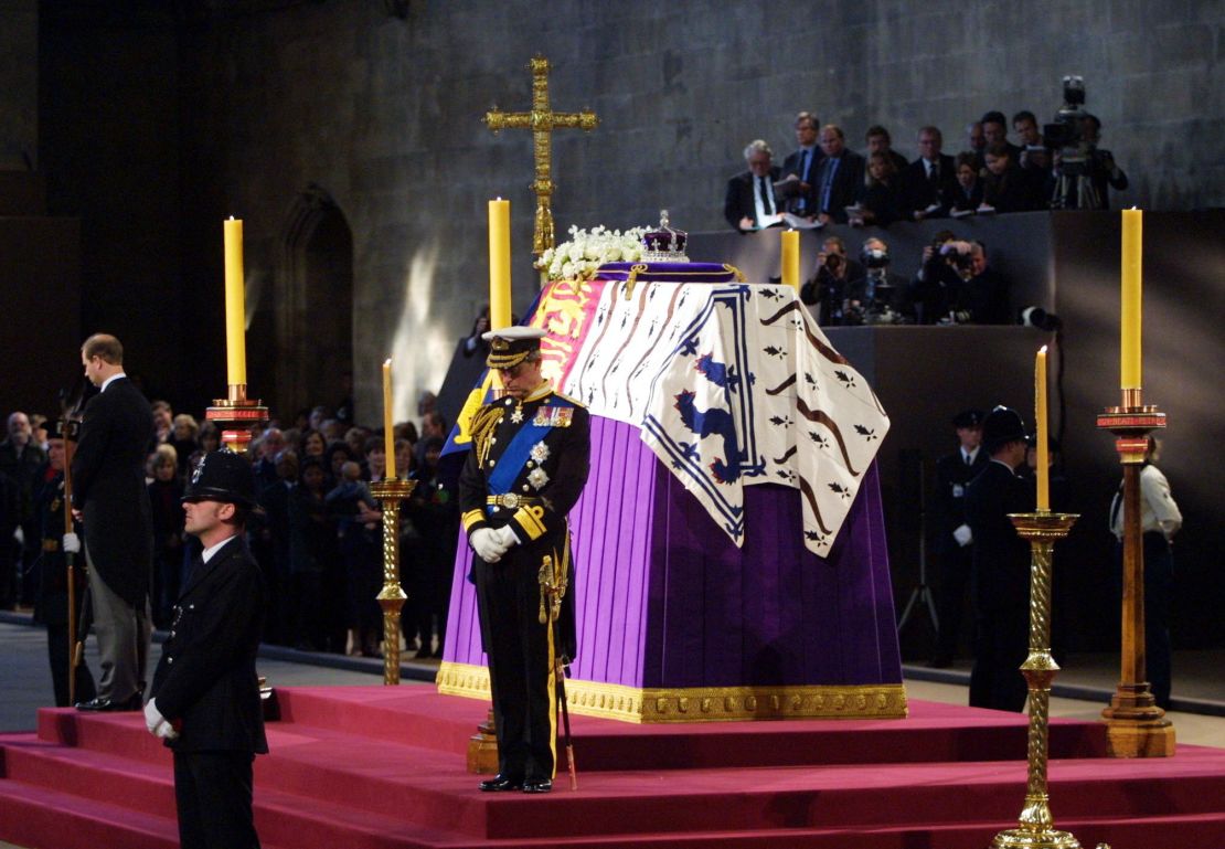 Then-Prince Charles and his brother Edward, left, stand vigil beside their grandmother's coffin while the Queen Mother lies in state at Westminster Hall in 2002.