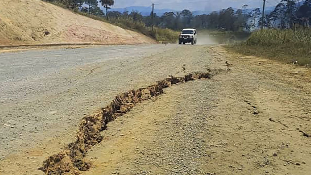 A large crack in a highway near the town of Kainantu, following a 7.6-magnitude earthquake in northeastern Papua New Guinea on Sunday, Sept. 11, 2022. 
